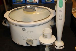 lot 271 image: GE 3 qt Slow Cooker and Braun Mixing Wand with Attachments as shown