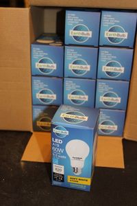 lot 275 image: Case of 12 60W LED light bulbs