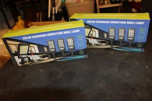 lot 281 image: Two sets Solar Charging Induction Wall Lamps