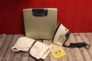 lot 254 image: Digital Bathroom Scales an Iron and Heating Pad