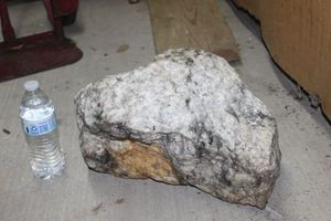 lot 302 image: Large Crystalline Rock ... See photos.. Water bottle for size reference only