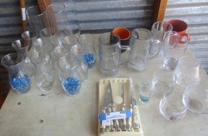 lot 20 image: Set of Christmas knives, clear glass vases , 2 Logans handled beer mugs, 2 shot glasses, drinking glasses (helton, BW 1)
