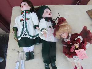 lot 27 image: Christmas porcelain dolls with 2 doll stands, Rosalyn sitting doll (helton)