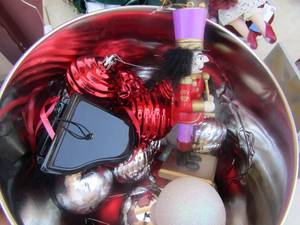 lot 30 image: Tin of random Christmas dcor (helton)