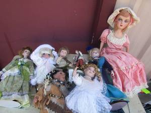lot 37 image: Vintage baby dolls on stands