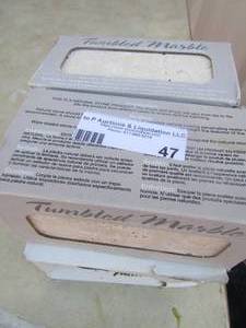 lot 47 image: 4 boxes of 3x6 tumbled marble tile