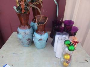 lot 53 image: 3 turquoise vases one has cracked broken top- various candle vases and candles
