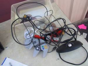 lot 55 image: Nintendo game controllers, av plugs and more