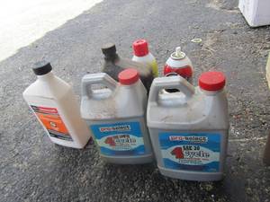 lot 59 image: oil lot and more, pro select 4 cycle sae 30, D-icer, motorcraft ford oil- fix a flat- Drano- foggers and more mostly used a few items are new