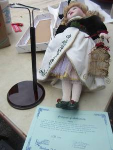 lot 61 image: Duck House Doll name is Dawn, comes with original box and certificate of Authenticity- she is in great condition
