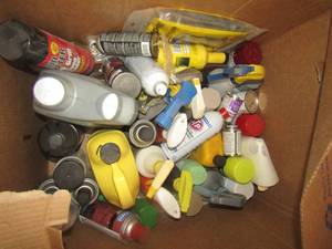 lot 72 image: Large lot of car care items cleaners, oils , gook be gone, chemical yard sprays and more all used