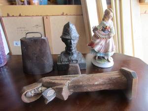 lot 74 image: Napco ware Porcelain doll, 2 cow bells, wooden male sculpture, The oxford bobby head dcor statue