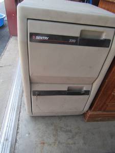 lot 82 image: 2 drawer very sturdy heavy filing cabinet- fire resistant, also has the key