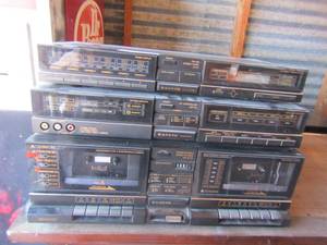 lot 88 image: 3 piece Sanyo surround sound plus am-FM radio with cassette player as well, no cords are wires included