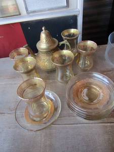 lot 97 image: brass mini tea pot with glasses and cup plates, qty 6 of each
