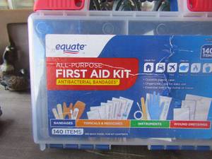 lot 105 image: Equate first aid kit   half full, some items have been utilized