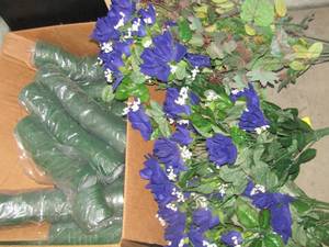 lot 122 image: Box of green floral tape and wax flowers for table dcor and more