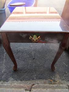 lot 132 image: wooden side table has minor damage