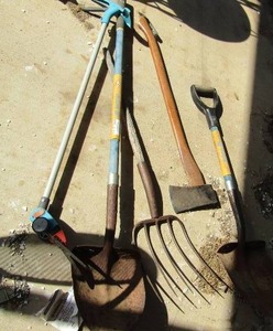 lot 142 image: garden yard lot- shovel, pitch fork- weed trimmer and a axe (ST)