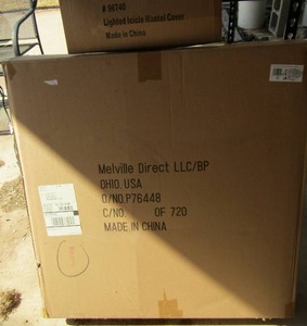 lot 143 image: 49710 pull up tree red decorated with lights, NIB- number will show actual merchandise-- lighted icicle mantel cover NIB # 96740 (ST)