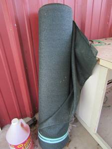 lot 159 image: Large roll approx. 6-8 ft. wide roll of weed blockground cover -- 4 ft. wide roll of top protector (ST)