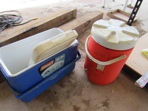 lot 176 image: Orange igloo drink cooler- blue igloo ice chest (ST)