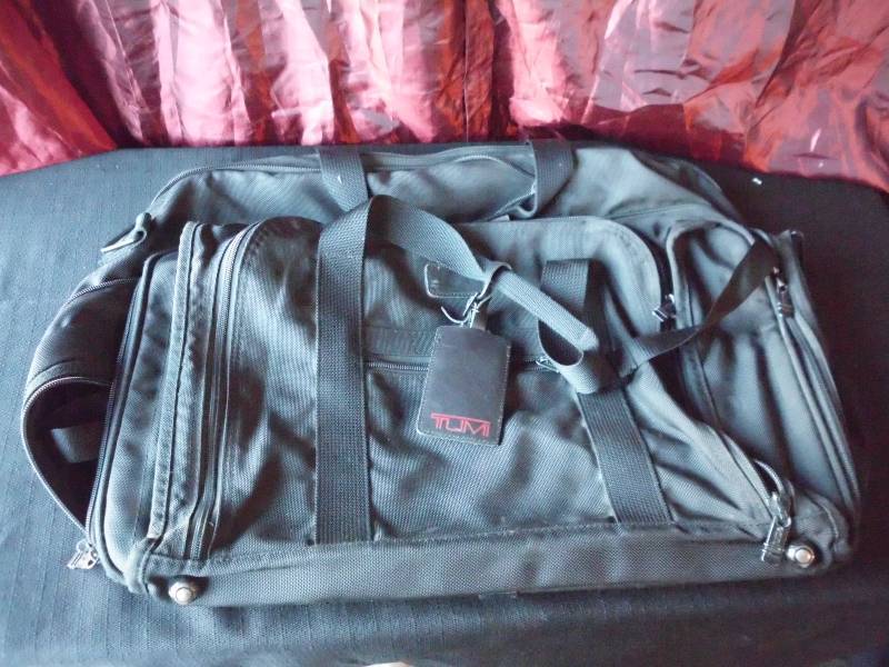lot 114 image: TUMI DUFFLE BAG