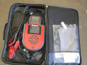 lot 51 image: Snap ON  charger in bag with paper work