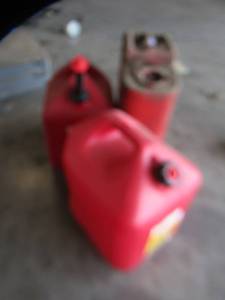 lot 55 image: 5 gallon gas cans  PLASTIC & METAL