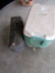 lot 62 image: igloo green cooler and a tent in bag