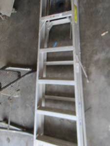 lot 66 image: Werner 6 step ladder and a Costco 4 step stepstool