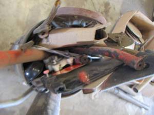 lot 81 image: bucket of metal pieces
