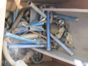 lot 98 image: Aluminum pieces piping , springs and more- pistons