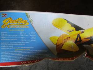 lot 135 image: the gee bee model plane unknown if all pieces are there and a yellow model plane