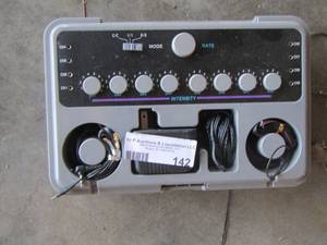 lot 142 image: TENS UNIT