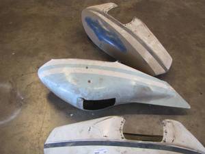 lot 187 image: 3 airplane wheel covers 2 are blue and 1 is baby blue