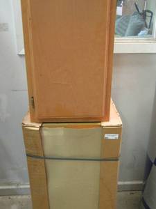 lot 33 image: 30X15X12 BROWN SMALL 1 DOOR CABINET, 30X18X14 1 DOOR CABINET