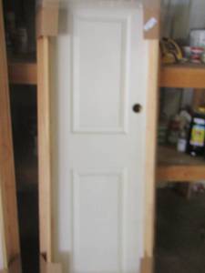 lot 241 image: 63x25 framed small door new