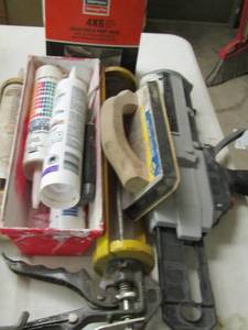 lot 67 image: 4X6 ADJUSTABLE POST BASE, CAULKING GUNS, PAINT TRAYS, PAINT ROLLERS AND MORE