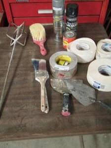 lot 110 image: PAINTER LOT INCLUDES PAINT BRUSHES, USED PAINTS, PAINTERS PUTTY, PAPER JOINT TAPE AND MORE