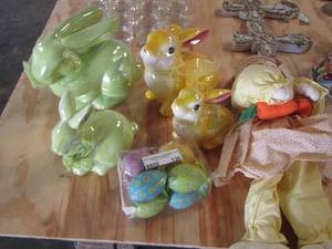 lot 136 image: Easter lot includes 4 glass bunnies 2 yellow 2 green, 8 dcor plastic eggs, stuffed bunny
