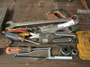 lot 155 image: tool lot includes saws, screw drivers, plyers, drill bits and more
