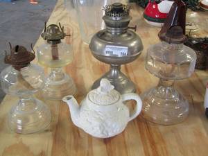 lot 164 image: 3 glass oil lamp basses has no top and 1 metal oil lamp with no top, 1 white tea pot