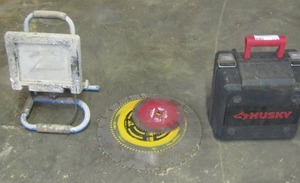 lot 173 image: small husky tool box, shop light, 3 saw blades