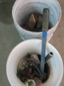 lot 189 image: 2 PAINT BUCKETS FULL OF SAW BLADES,BRAKETS, PLC. AND MORE