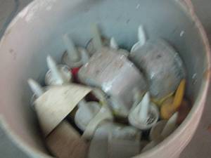 lot 194 image: PAINTER BUCKET OF ALUMINUM TAPE AND VARIOUS CAULK