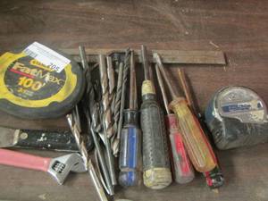 lot 205 image: drill bits, measuring tapes, screw drivers, and more