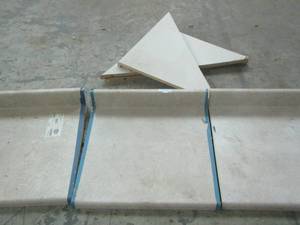 lot 238 image: 24x24 Hampton bay countertops, quantity three and three corner pieces cut