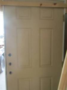 lot 243 image: 82x38 door with door frame and 3 door know holes