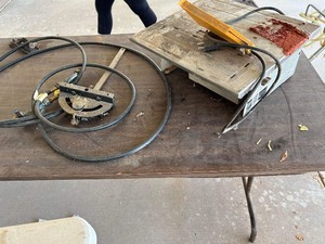 lot 275 image: TILE SAW  & 2 PROPANE TANK HOSES